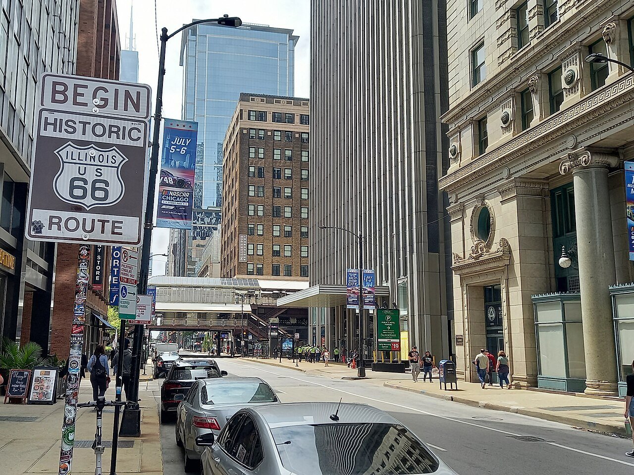 Begin Historic Route 66 sign on a downtown Chicago street.