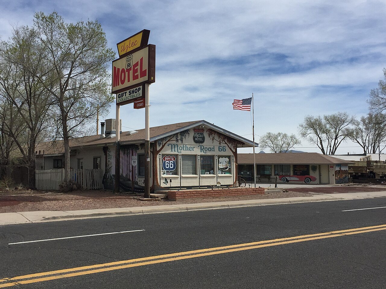 Vintage Route 66 motel sign and storefront in Seligman, Arizona.